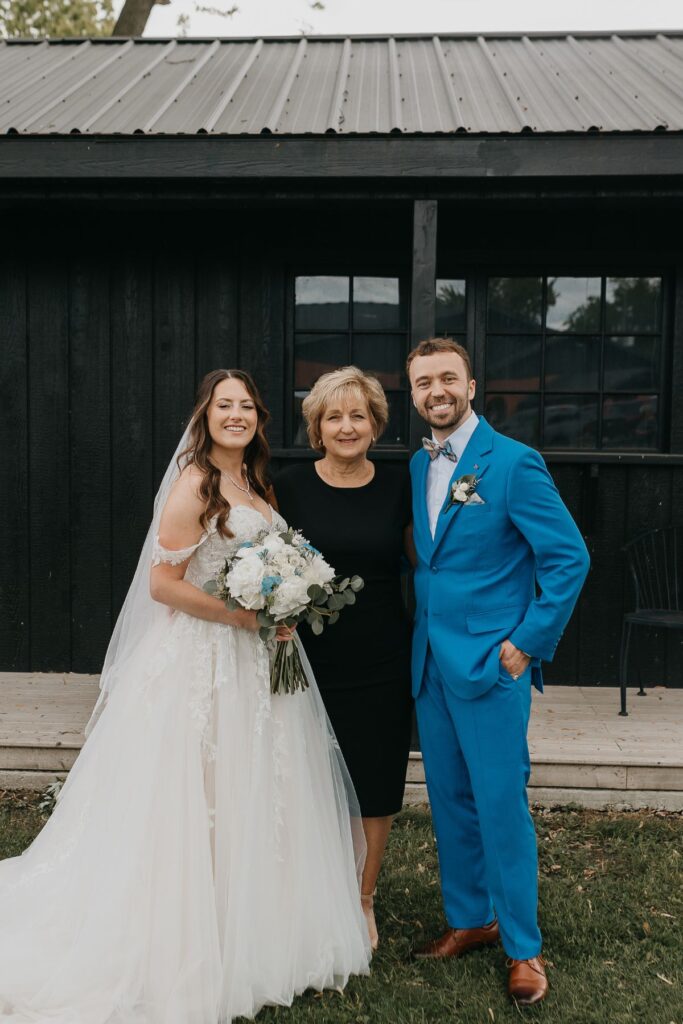 Couple during wedding ceremony with Sandra Marko officiating