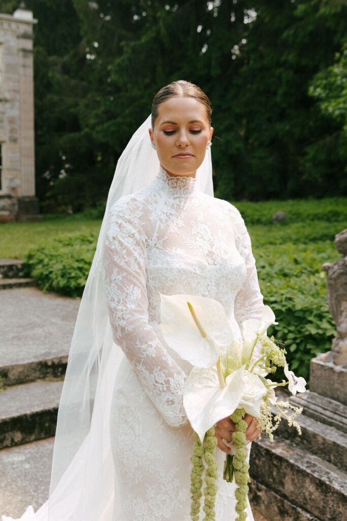 Bride with wedding flowers by Fire & Flora in Collingwood